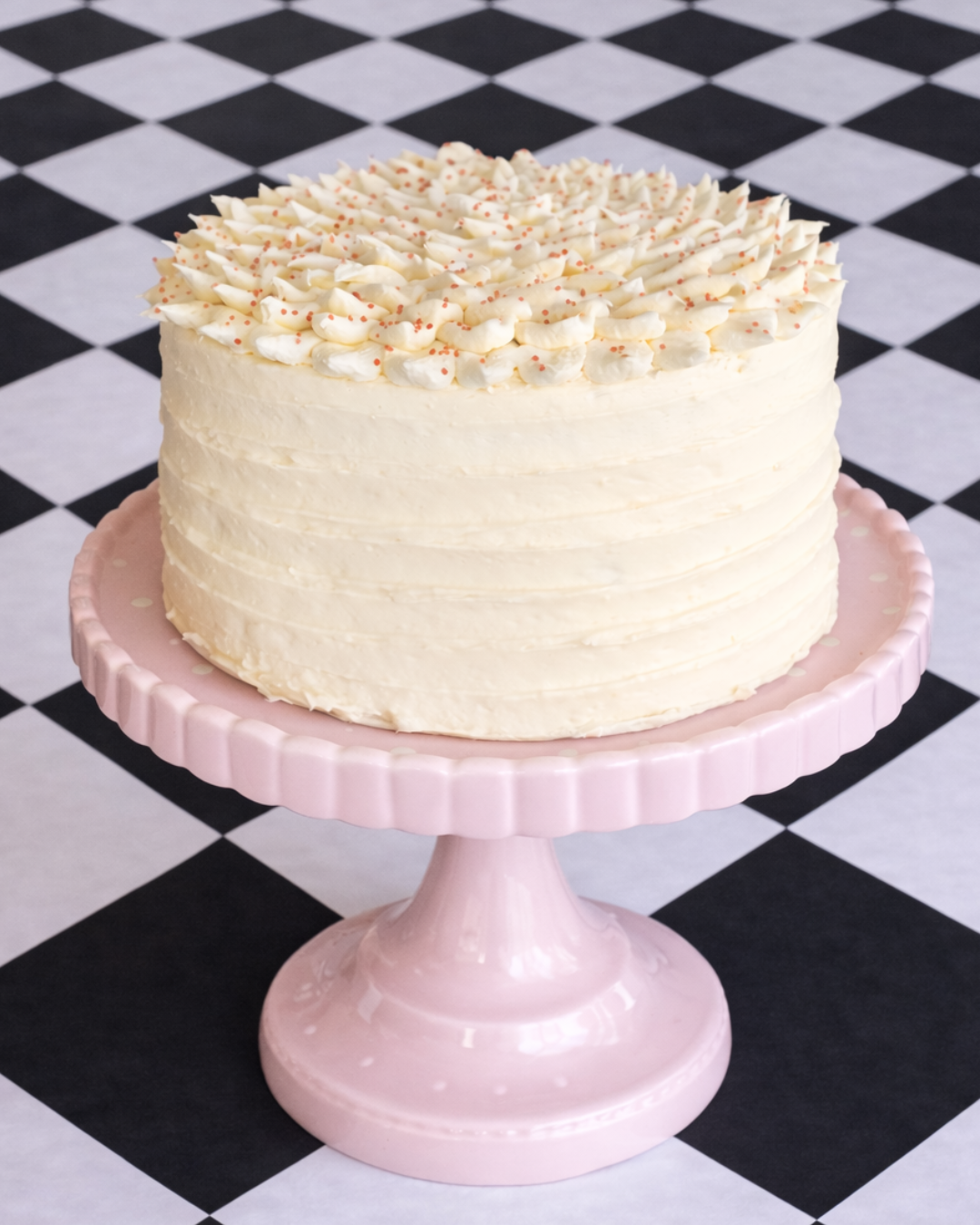 red velvet cake with light pink cream cheese icing