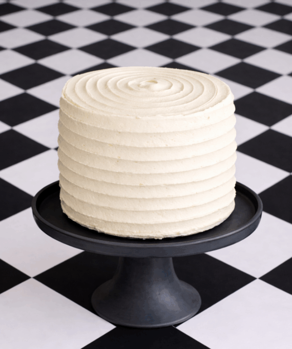 banana cake with white buttercream icing