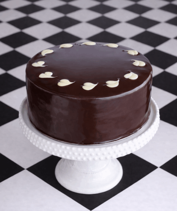 dark chocolate cake covered in chocolate ganache